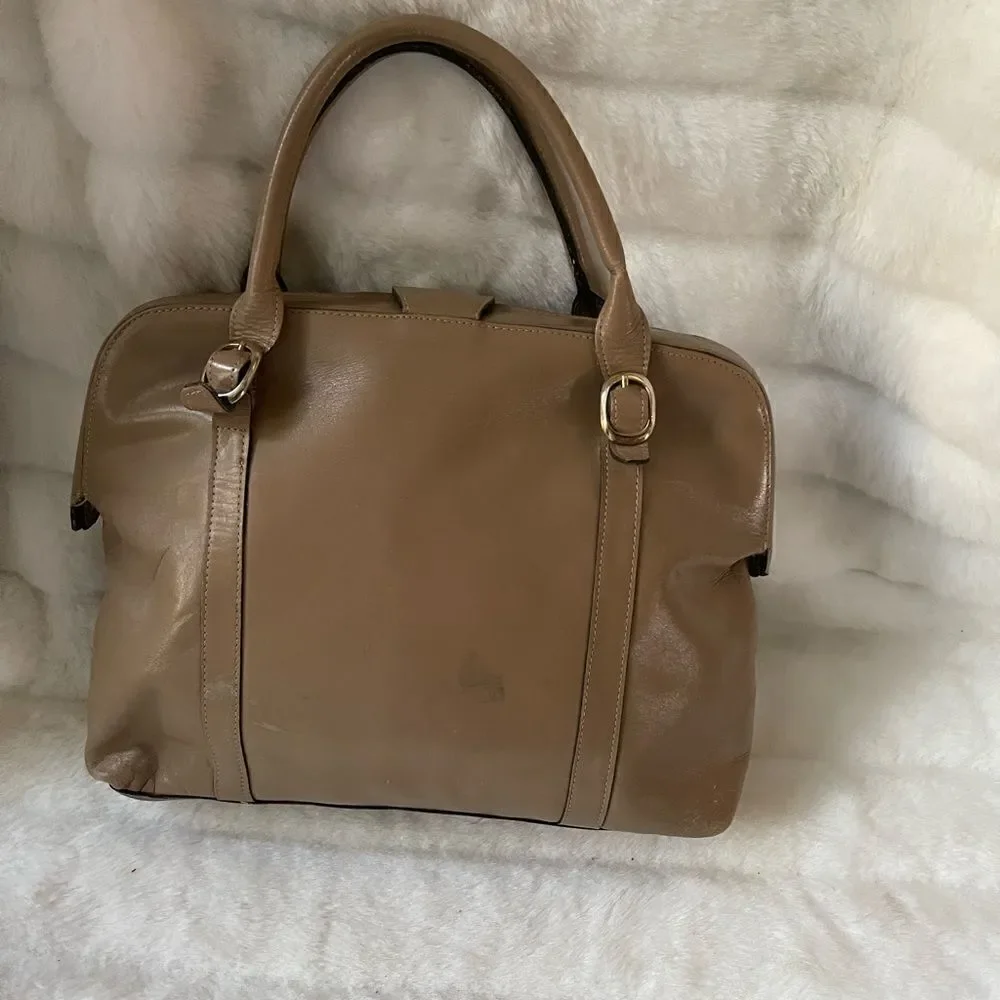 Tano Leather tan frame medium satchel gold tone hardwares .